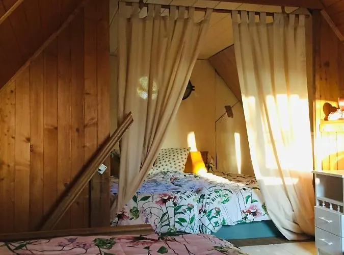 Деревянный коттедж Nad Jeziorem Otalzyno Pomieczyno